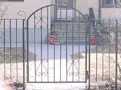 Image of a gate with a custom iron inlay.